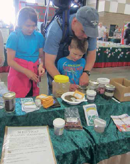 Seed sharing is a family affair at the Mother Earth News Fair.