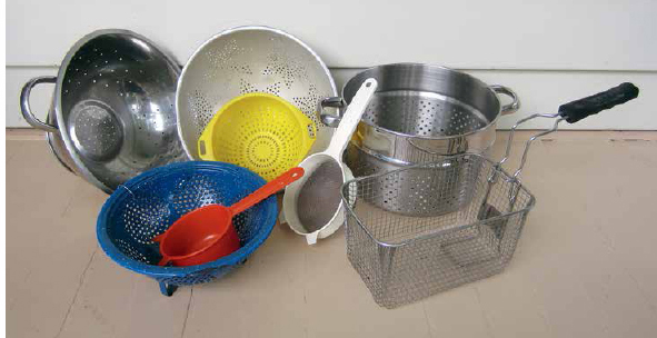 Collection of strainers and colanders to clean seeds. Find these in your kitchen or at yard sales.