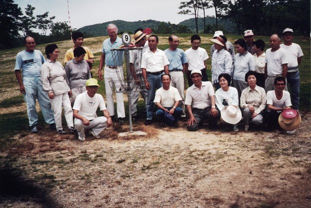 A group of people posing for a photo  Description generated with very high confidence