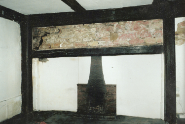 Fig. 11. The Great Hall before the removal of the 1950s hearth that had been substituted for the original 14-foot opening defined by the beam above it.