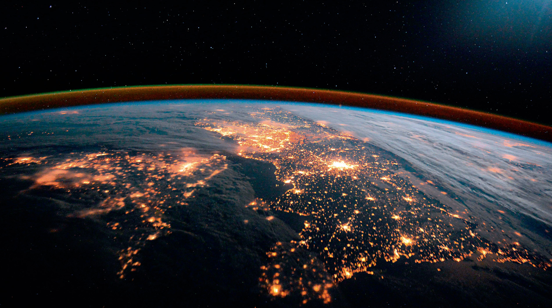 This picture of the curvature of the Earth with south of England (left) and the north coast of France (right), separated by the darkness of the English Channel, was taken by British astronaut Tim Peake on board the International Space Station.