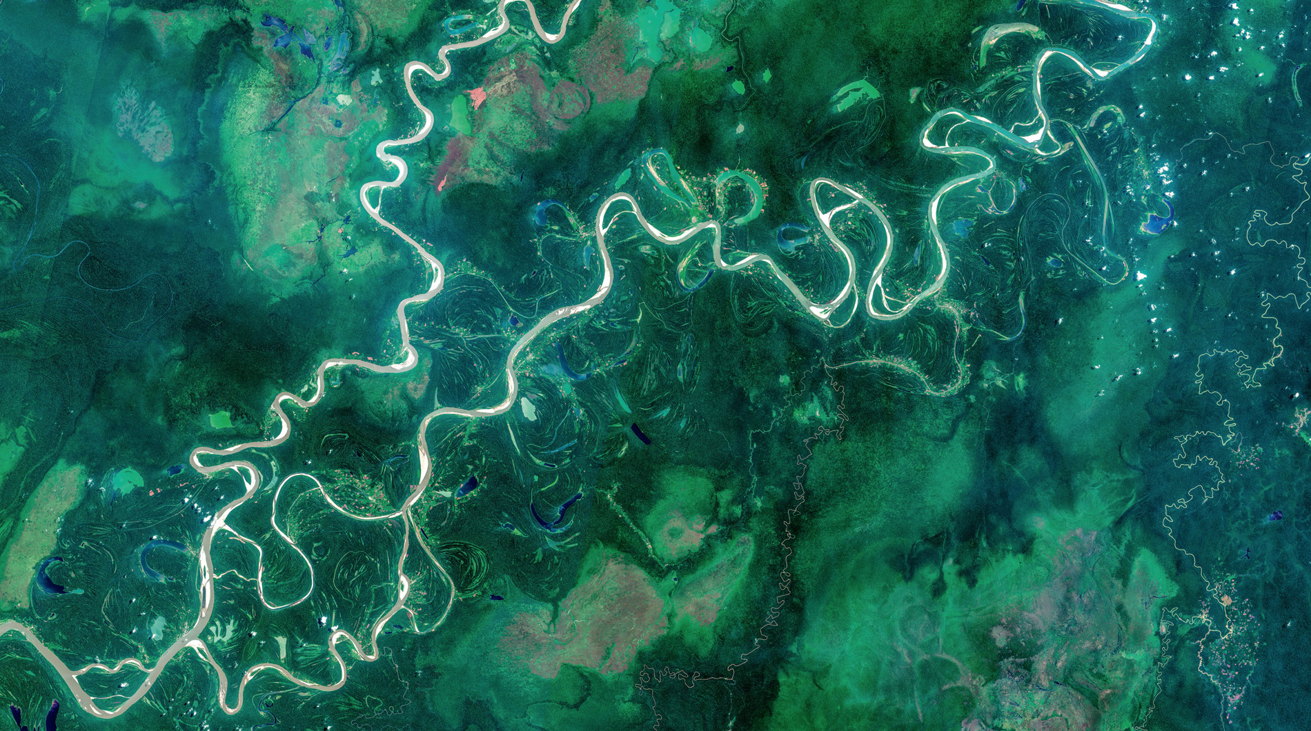 On its tortuous way to the sea, the Amazon River is quite literally ‘all over the map’. The greater the amount of sediment carried, the more frequently the river meanders and the more likely oxbow lakes are to be formed. © ESA