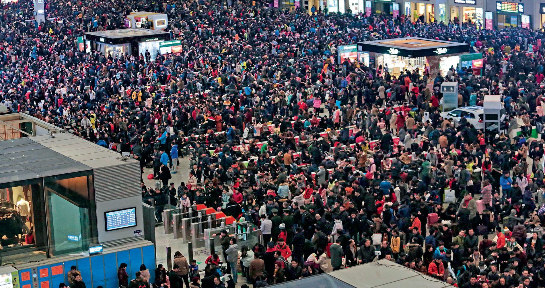 Railway stations are packed tight with travellers heading for their homes to celebrate the New Year with their families. Tickets cannot be purchased before 60 days, so there is usually a last minute rush when up to 1,000 tickets are sold per second.