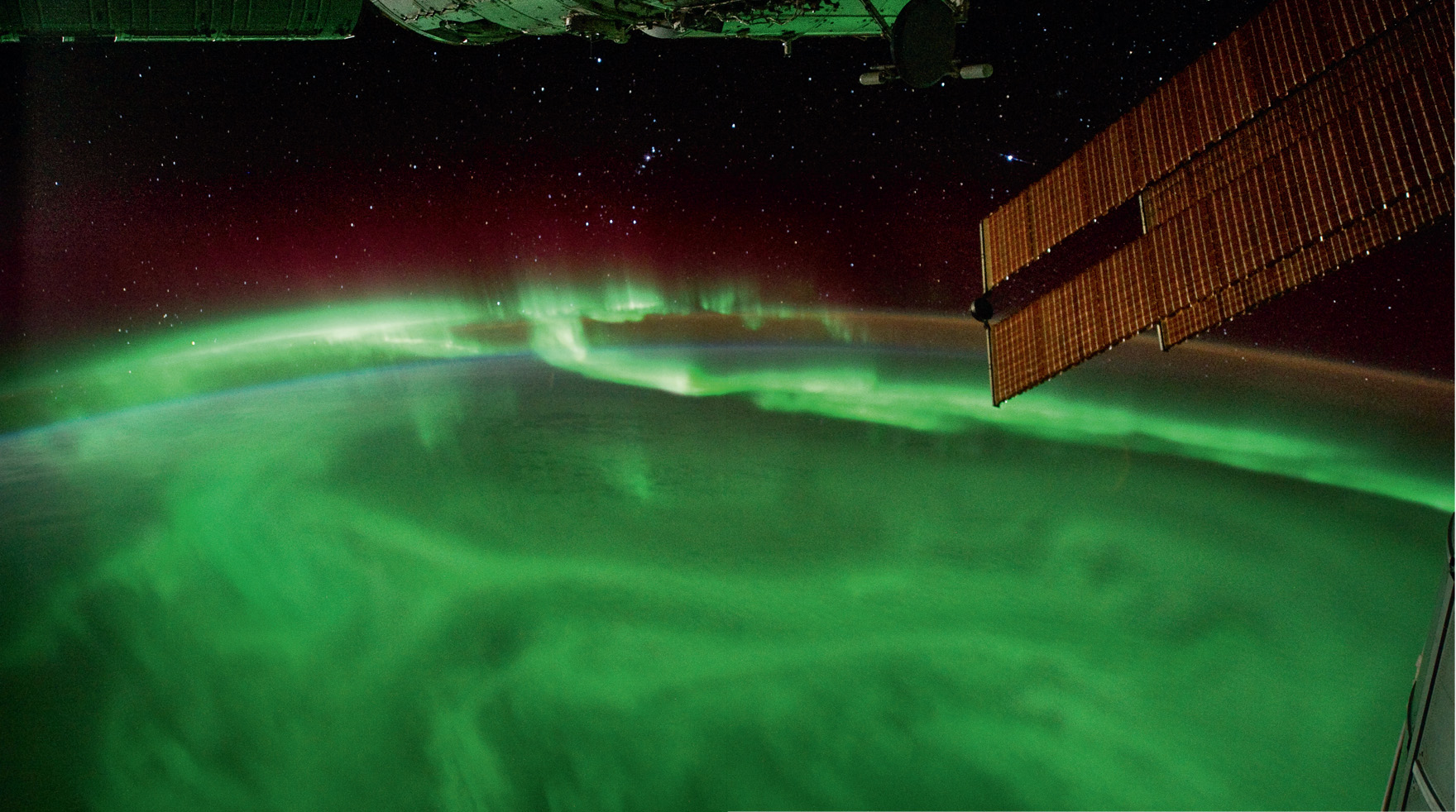 AURORA FROM ABOVE From the International Space Station, crews can observe auroras from space. From this viewpoint, the phenomenon appears to cling to the Earth, although the base of the aurora is actually 100 kilometres above our planet’s surface. © Image courtesy of the Earth Science and Remote Sensing Unit, NASA Johnson Space Center.