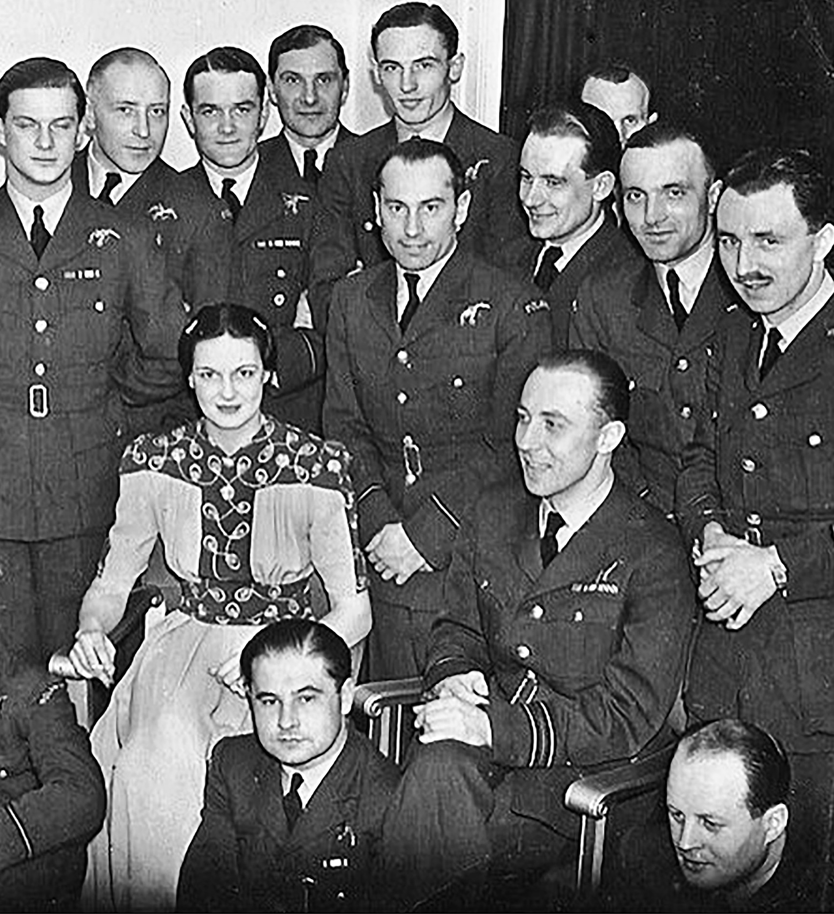 Some 303 Squadron pilots with their “mother,” socialite Jean Smith-Bingham.