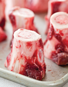 Knobs of beef bone on a steel tray