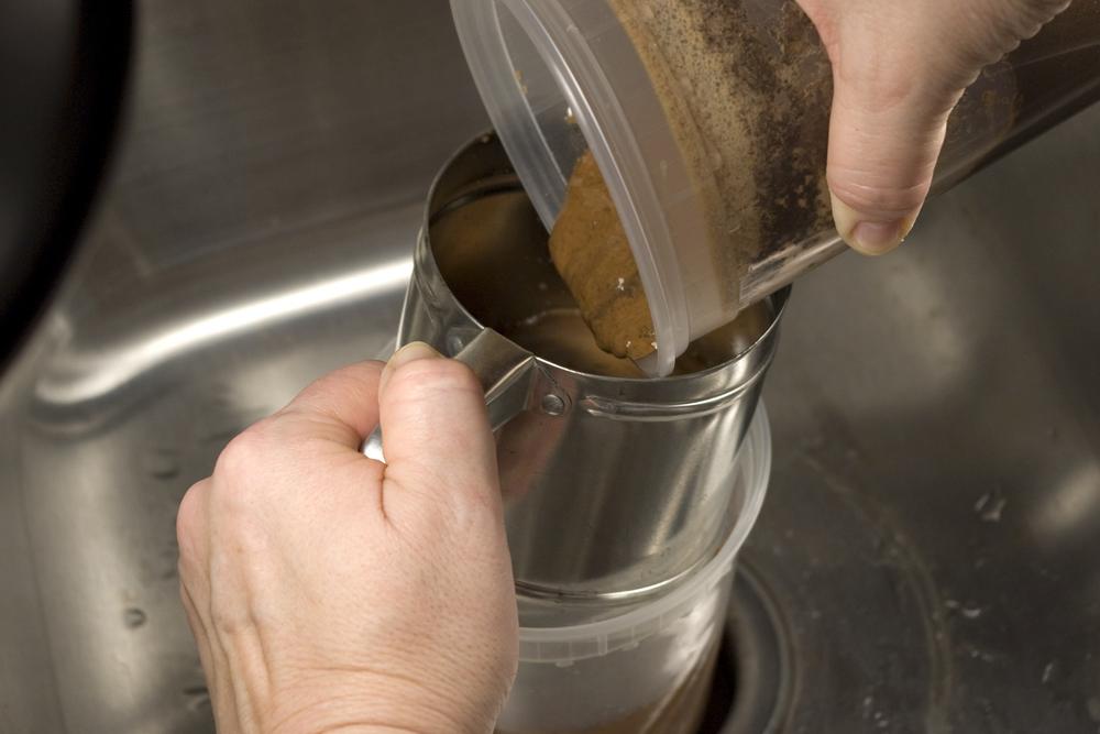 Wet sieving a soil specimen