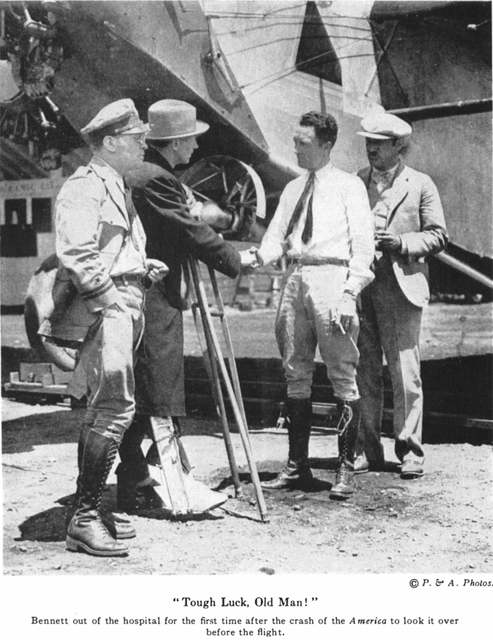 © P. & A. Photos. “ Tough Luck, Old Man! “ Bennett out of the hospital for the first time after the crash of the America to look it over before the flight.