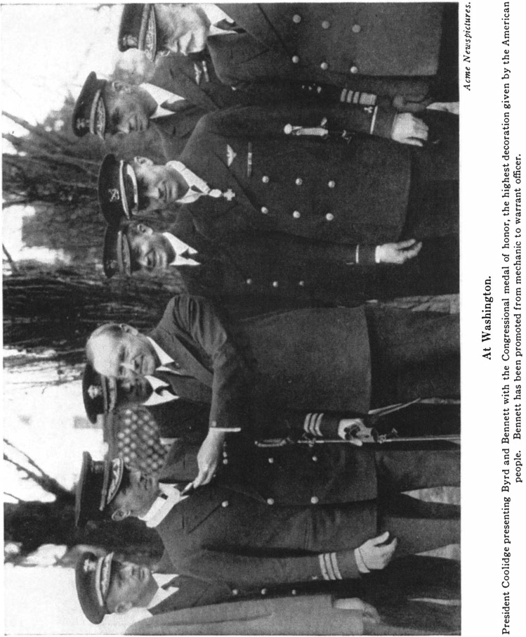 Acme Newspiclures. At Washington. President Coolidge presenting Byrd and Bennett with the Congressional medal of honor, the highest decoration given by the American people. Bennett has been promoted from mechanic to warrant officer.