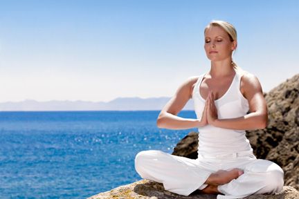 (Meditating)shutterstock_83853196.jpg