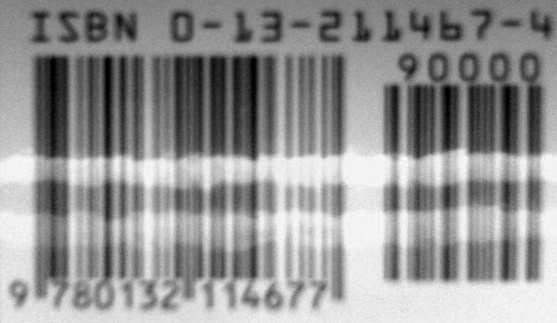 Barcode image blurred by being taken from inside the focal length of the camera lens, causing bars to run together