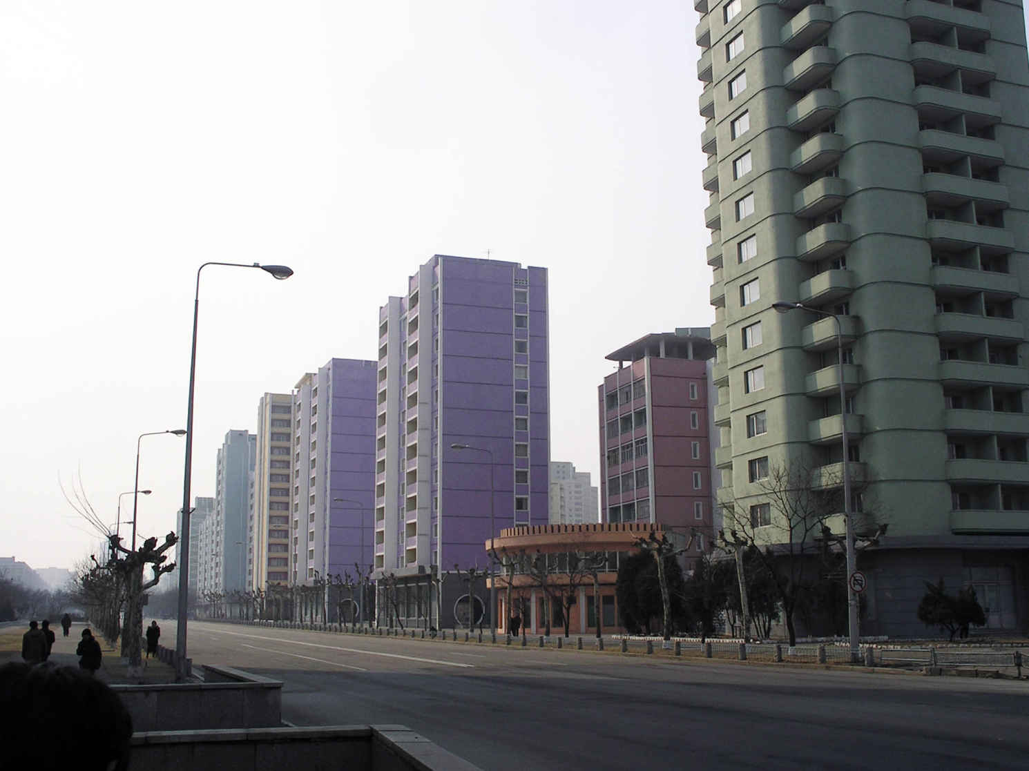 Photograph: Buildings in downtown Pyongyang, showing an absence of all automobile traffic.