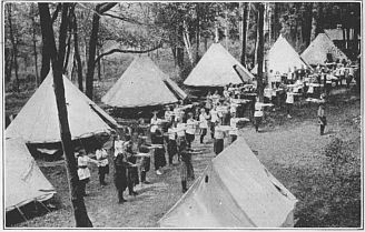 The Tent "Green." Conical wall tents accommodating eight cots. Not easy to put up and give little head room.