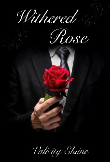 A person holding a rose  Description automatically generated with medium confidence