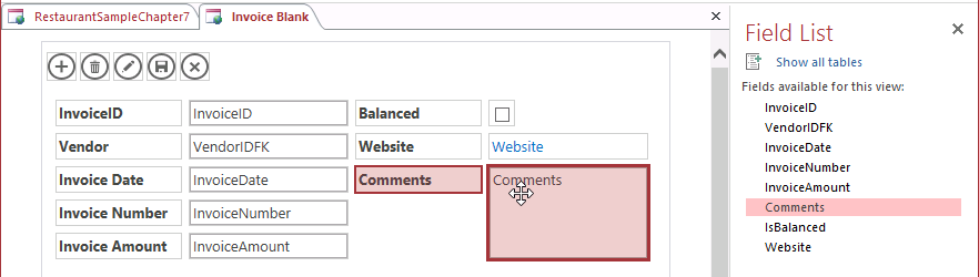 A screen shot of the Invoice Blank view opened in Design view. The IsBalanced, Website, and Comments fields are now added to the view design grid.