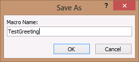 A screen shot of the Save As dialog box in Access. Author entered TestGreeting into the Macro Name box.