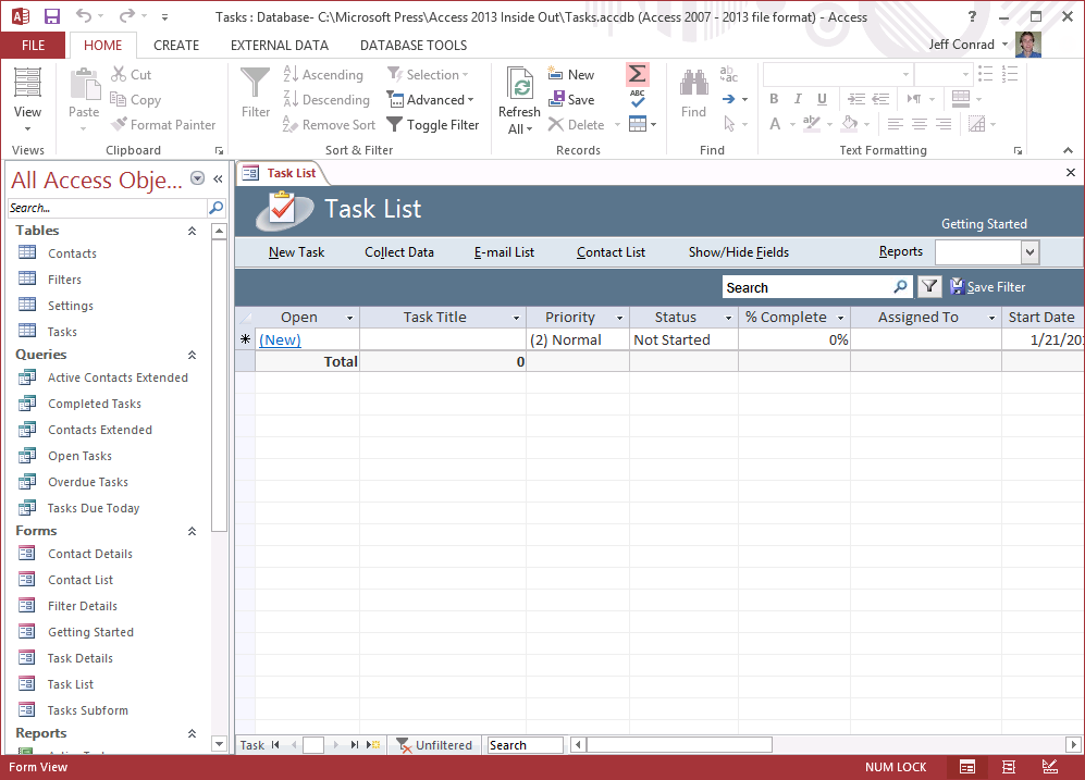 A screen shot of the Tasks desktop database. The Navigation pane displays a list of objects in the database. The Task List form is currently open in the application window.