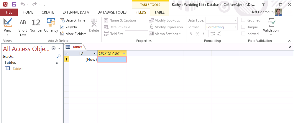 A screen shot of a new blank desktop database opened in Access. A table object called Table1 is opened in Datasheet view in the main application window.