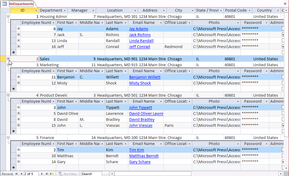 A screen shot of the tblDepartments table in the Housing.accdb sample file opened in Datasheet view. Plus and minus symbols for expanding and collapsing related records from the employees table are shown.