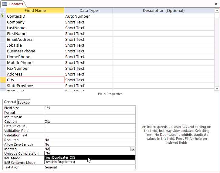 A screen shot of the Contacts table open in Design view. Author selected the City field and then clicked the Indexed property. Three options are displayed: No, Yes (Duplicates OK), and Yes (No Duplicates).