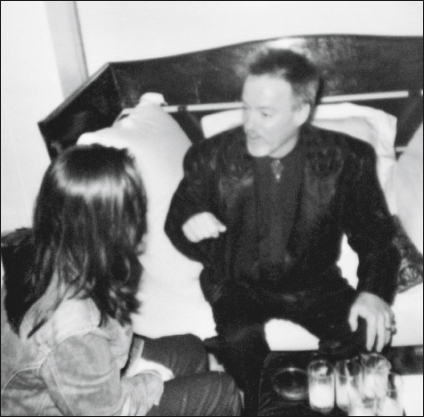 A candid shot giving tender private guidance to a wayward young girl sometime in the late ’90s.