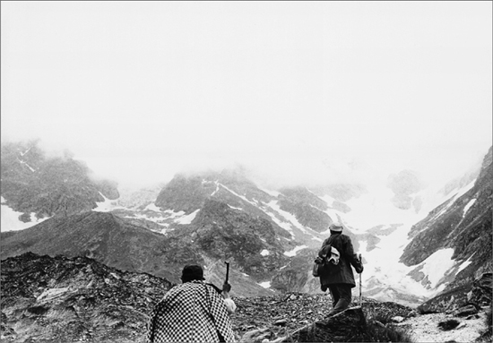 Two men hiking in the Alps