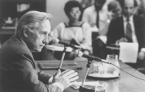 Brian E. Urquhart, undersecretary-general for special political affairs, answers questions in June 1985 about his mission to the Middle East to free soldiers of the UN Interim Force in Lebanon. (UN Photo 165579/Y. Nagata)