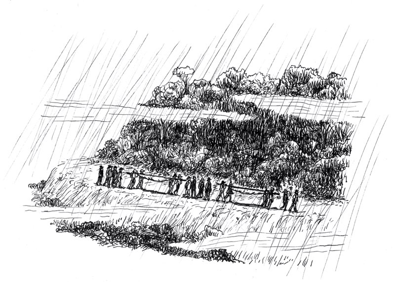 Group of a dozen men carrying stretchers with mist and rain falling