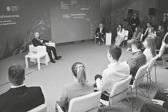 Russian President Vladimir Putin attends a meeting with young entrepreneurs and startup developers on the eve of the St. Petersburg International Economic Forum (SPIEF), at the Technograd Training Complex in Moscow, Russia, Thursday, June 9, 2022. (Mikhail Metzel, Sputnik, Kremlin Pool Photo via AP)