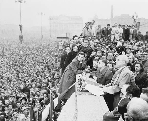 (Original Caption) Polish Riot. Warsaw, Poland: An estimated 20,000 Poles rioted October 4th night, battling police and militia men in central Warsaw. Many of the rioters shouted for the downfall of Communist Party Chief Wladyslaw Gomulka, seen here in a picture from files addressing what is believed to have been the largest street gathering ever seen in Warsaw, an estimated 500,000 persons, October 24th, 1956.