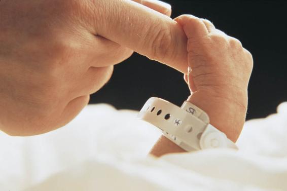 In this array of four photos, common examples of infant relexes are shown. 1. Grasping. A baby’s tiny hand grasps an adult’s finger. 2. Rooting. The baby turns its head, mouth open, looking for a nipple, prepared to latch on to a finger instead. 3. Sucking. A baby nurses at its mother’s breast. 4. Tonic neck reflex. The baby’s head is turned to one side, and the opposite arm is raised to its head.