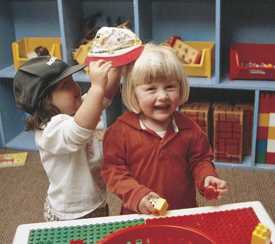 Photo of two little girls playing together.