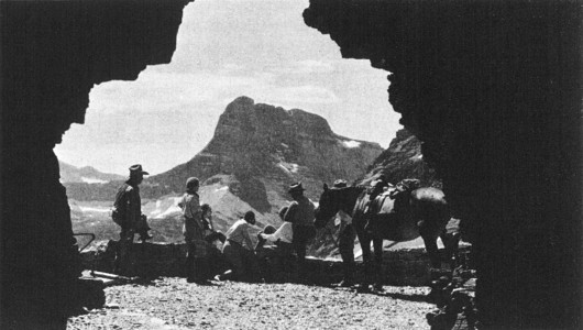 RESTING AT THE SOUTH PORTAL OF THE TUNNEL ON PTARMIGAN WALL TRAIL