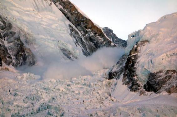 The moment when a gigantic avalanche engulfs the entire breadth of the Khumbu Icefall