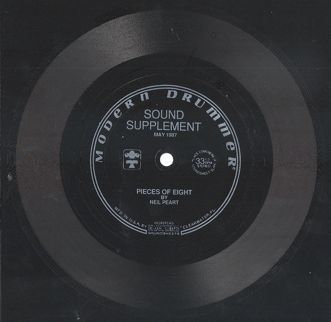 A black plastic 45 rpm record with the text 'Modern Drummer' printed on the record label.