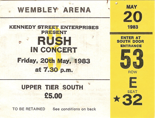 A yellow, black, and white ticket for a Wembley Arena show.