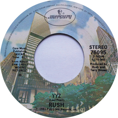 The record label for Mercury's 'YYZ' single. Similar to the 'Subdivisions' label, it features the same office imagery as a background.