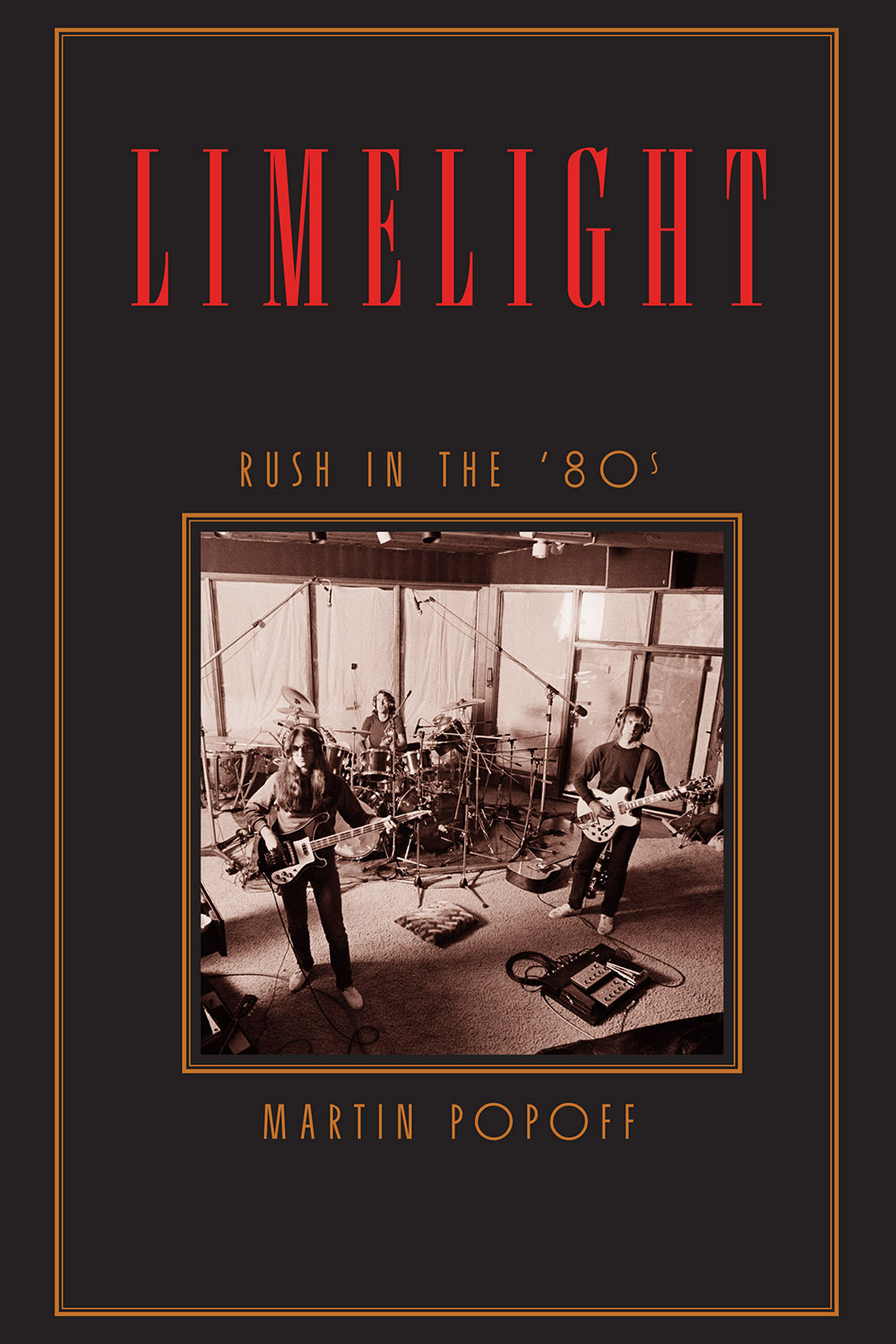 A sepia-colour photo of the band playing in the studio is framed in brown on a black background. 'LIMELIGHT' appears in tall red font at the top of the cover, and in brown font it reads 'Rush in the '80s / Martin Popoff.' The font used throughout resembles the one used on the Permanent Waves album cover.