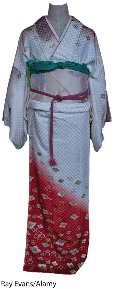 A photo shows kimono displayed on a mannequin. This traditional Japanese attire for women is in the form of a long free-fitting gown and is draped on the mannequin with a band around the waist and decorative knots above and over it.