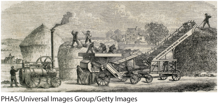 A sketch shows farmers feeding hay to an early version of an agricultural machine. Houses and trees are in the background.