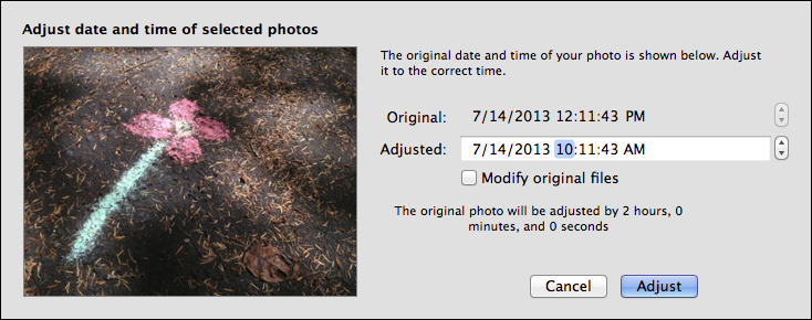 <strong>Figure 28:</strong> Changing the time in iPhoto.