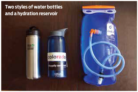 Two styles of water bottles and a hydration reservoir