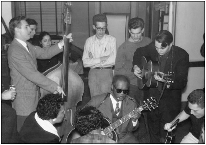 The Folk Scare Begins: The Reverend Gary Davis, with fans including Happy and Jane Traum (behind unknown bass)