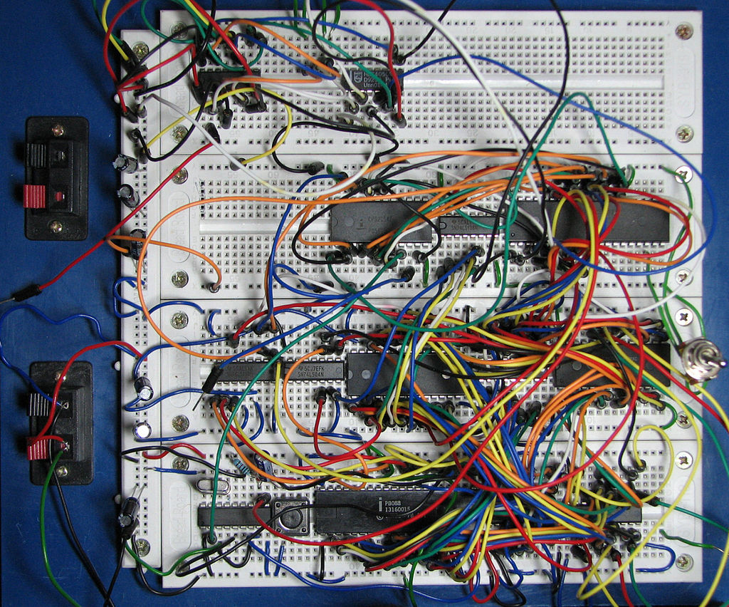 An electronics breadboard prototype (courtesy Wikimedia Commons)