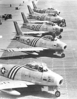 Five F-86As of the 4th Fighter Group in mid-1951. Note the extended wing slats. HRA