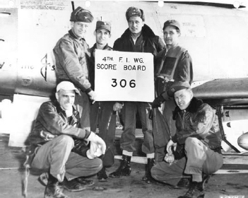 Clockwise from lower left are some of the aces of the 4th Fighter Group