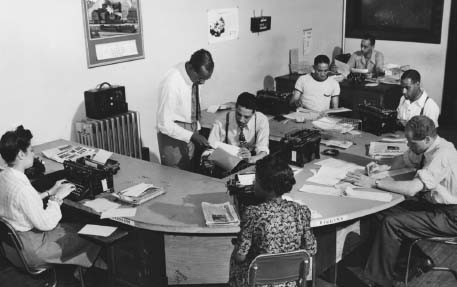 People’s Voice newsroom, c. 1942. The woman on the far left is believed to be Ann Petry. Photo by Morgan Smith.