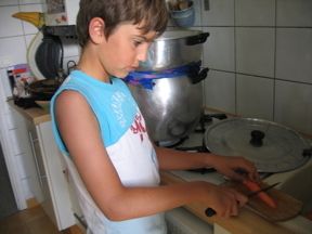 Saji preparing vegetables.