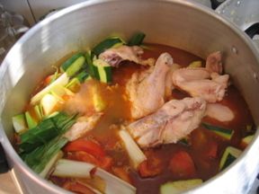 Vegetables & meat simmering for couscous.