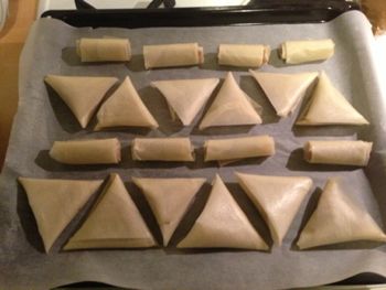 Triangles and cigars ready for cooking